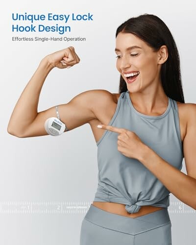 Woman showing fitness device on arm with easy lock hook design.